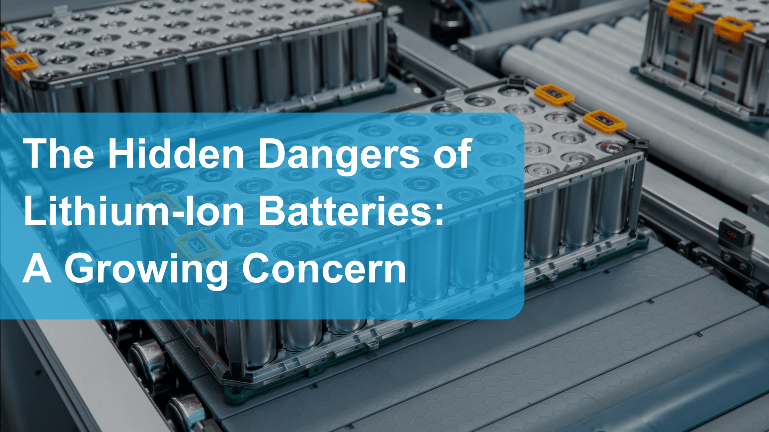 The hidden dangers of lithium-ion batteries: a growing concern feature image. titles is in white text, inside a blue box with lowered opacity. the background is of lithium ion batteries in cases on a conveyor belt at a factory